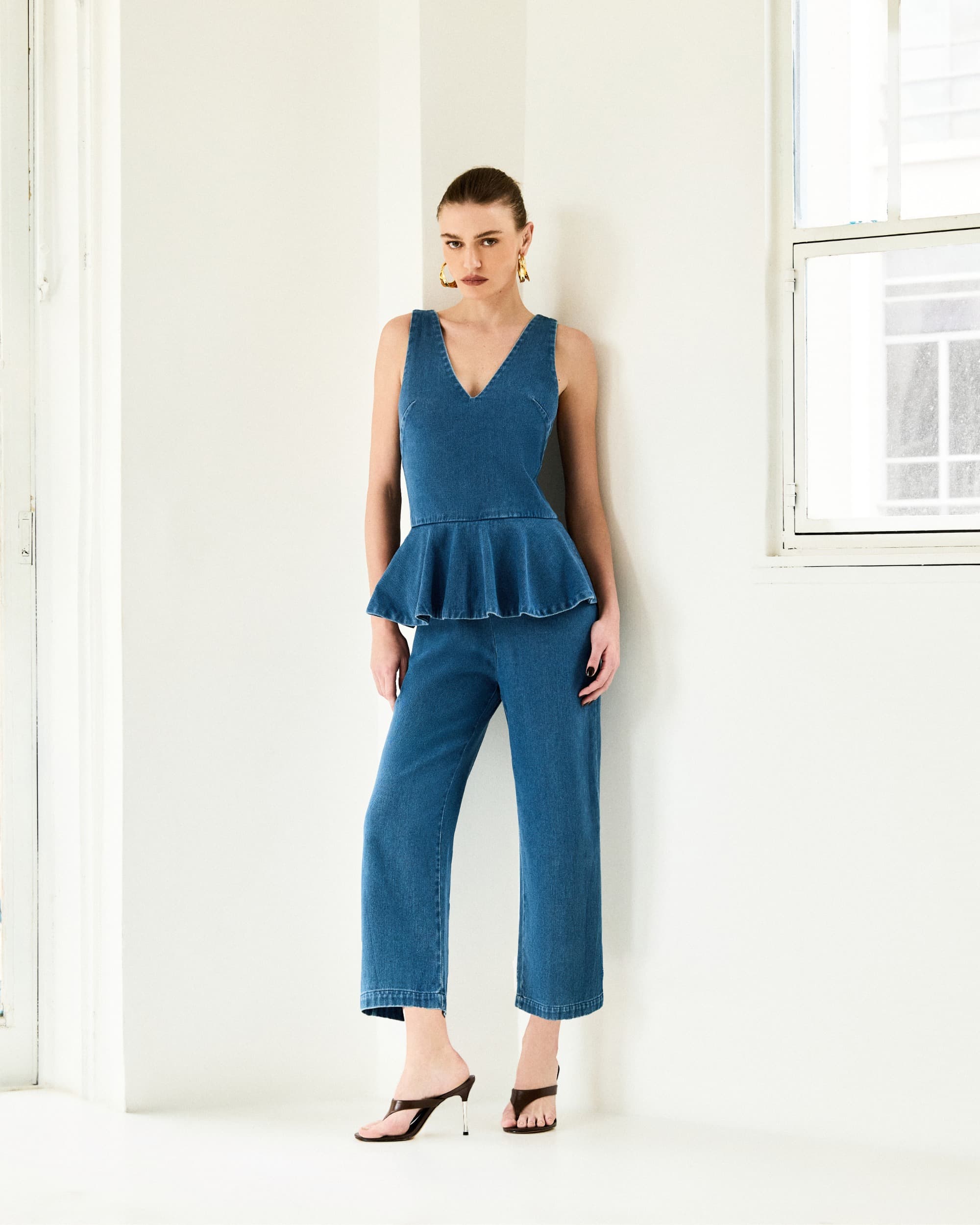 MACACÃO DENIN PEPLUM